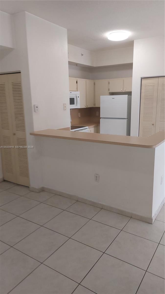 PALM GARDENS AT DORAL CON - Residential Lease