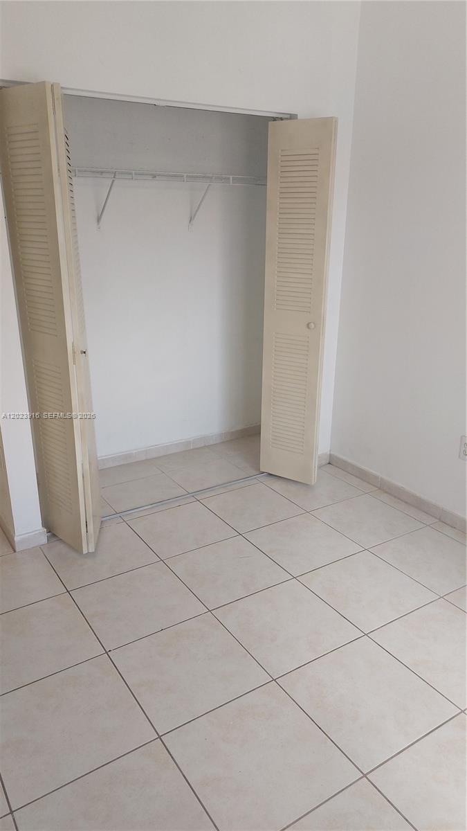 PALM GARDENS AT DORAL CON - Residential Lease