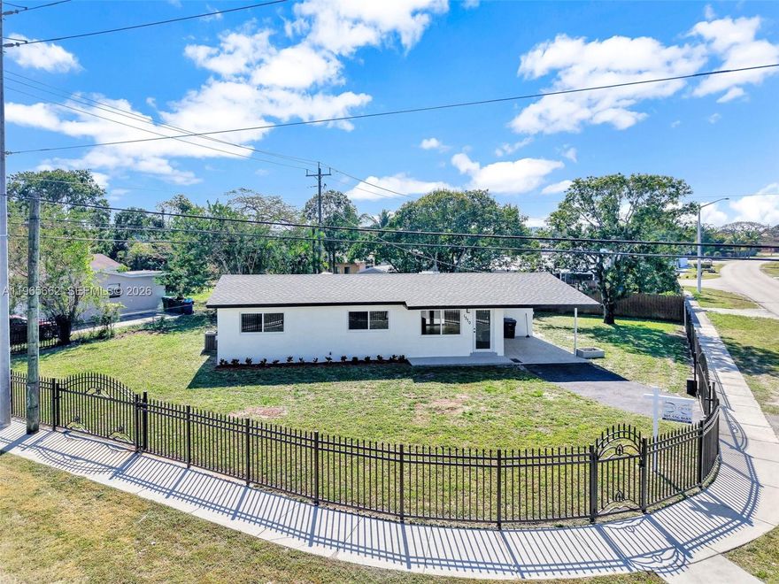 Welcome to your dream home, completely updated from top to bottom! This beautiful 3-bedroom, 2-bathroom residence that can easily be converted to a 4 Bedroom home. Sits on a very large corner lot and offers the perfect mix of style, comfort, and functionality. Enjoy peace of mind with a brand-new shingle roof, impact windows and doors, and freshly updated pool area ideal for relaxing or entertaining.

Step inside to find a modern open-concept layout, a new gourmet kitchen with a sleek peninsula, quartz countertops, and stainless steel appliances. Both bathrooms have been fully remodeled with elegant finishes and contemporary design. The spacious living areas are filled with natural light, creating a bright and inviting atmosphere throughout.

Located in a quiet neighborhood close to major highways, shopping, and schools, this move-in ready gem offers everything you’ve been looking for — and more!