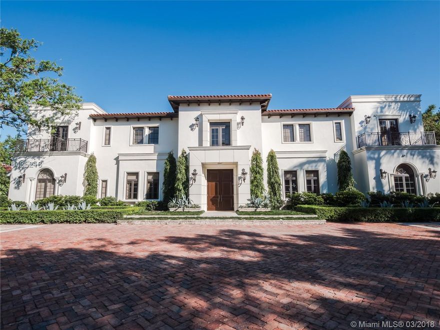 Welcome to living at its finest! This gorgeous estate is move-in-ready and truly has it all. This impressive architectural statement blends modern living and classic luxury. You are greeted in an elegant grand entry. With 8 generous bedrooms, 9 well appointed baths, a chefs kitchen, this home was built to entertain friends and family.  Enjoy Miami's beautiful weather on your own private terraces, relax by the pool and spa, or by the impressive courtyard, with its gazebo, BBQ, and bar. Pick up a game of basketball on the lighted court, or if it’s too hot, take it inside and exercise in the home gym. The kids will never get bored on the in ground trampoline or in the playroom! Other amenities include a custom walk in wine room, master bedroom, glamorous media room and 6 formal gardens.