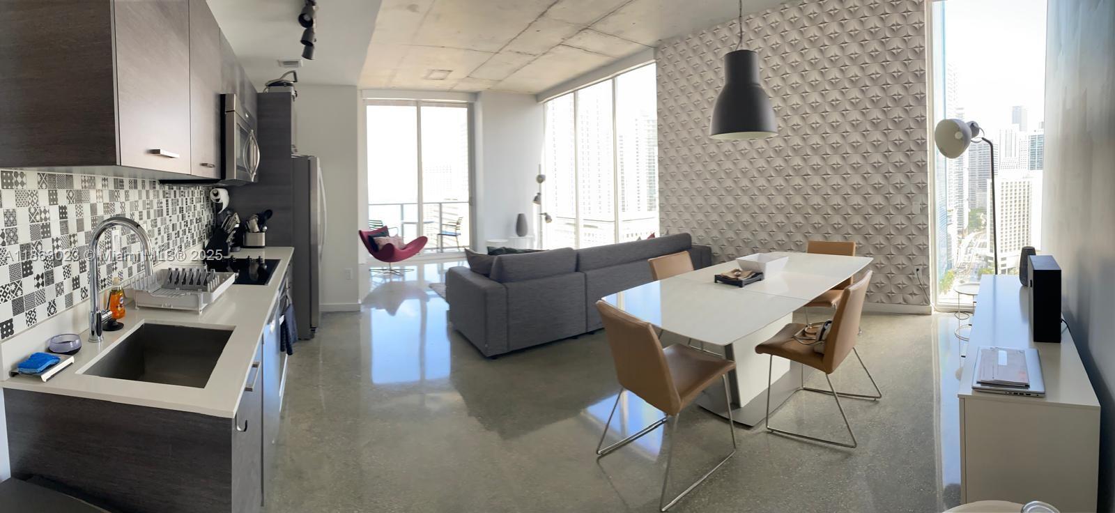 Invest in this modern 2-bedroom, 2-bathroom apartment located in the vibrant heart of Downtown Miami at 151 SE 1st Street. Featuring an open layout with floor-to-ceiling windows, sleek kitchen with stainless steel appliances, and stunning city views. The building offers premium amenities including a rooftop pool, fitness center, social lounge with pool table, media room, and coworking spaces. While the unit has no private parking, convenient valet parking is available. Steps from top restaurants, shops, Bayside, Brickell, and Metromover, this property is perfect for professionals or short-term renters seeking an urban lifestyle. High rental demand makes it an excellent investment opportunity.