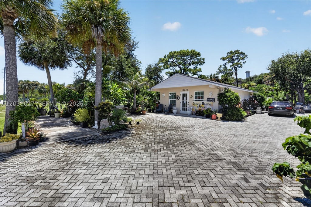 Photo of 12360 SE Dixie Hwy, Hobe Sound, FL 33455 (MLS # A12033017)