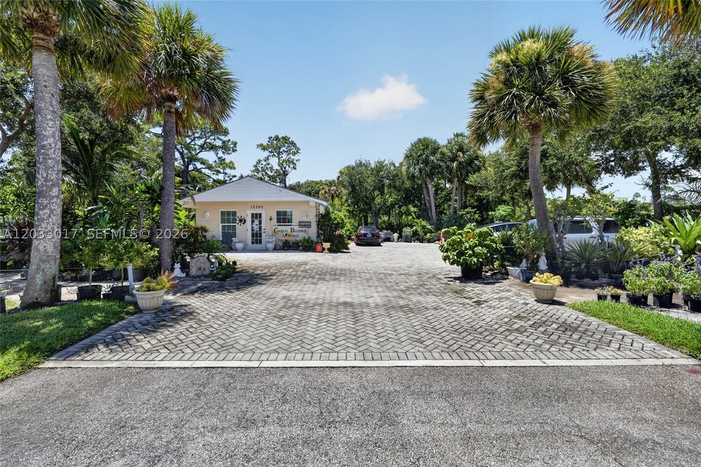 Photo of 12360 SE Dixie Hwy, Hobe Sound, FL 33455 (MLS # A12033017)