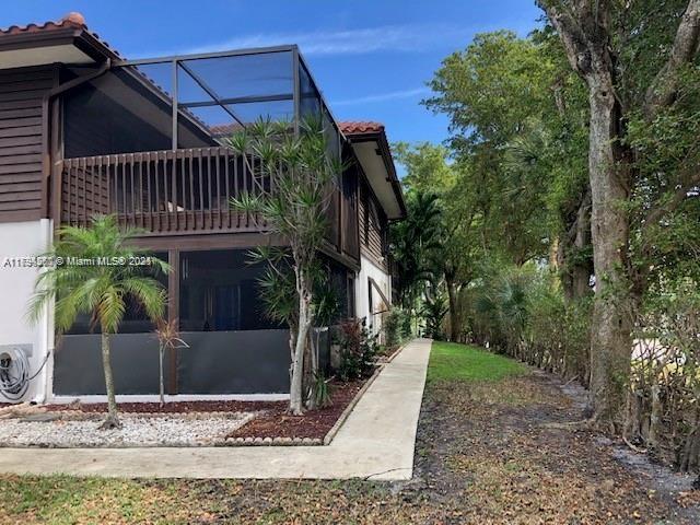Rent this beautiful and spacious townhome with two master suites located close to downtown Boca and the beach. Brand new impact windows and sliding doors just installed. Large, open kitchen has been upgraded with granite counters, oak cabinets, custom faucet, double pantry and includes 17 feet of countertop! Wood laminate and tile floors. Fenced, covered and screened tiled patio downstairs perfect for entertaining. Both bedrooms upstairs have full baths plus sliding door access to a sun deck/balcony.