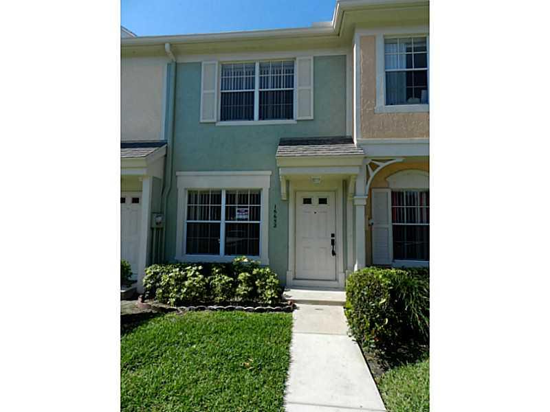 Extraordinary TH located in the heart of Weston, completely updated, nice Laminated wood floors in 2nd story and stairs, New appliances Stainless steel, Freshly painted, new lights fixtures, fans operated with remote control. See it and call it Home.