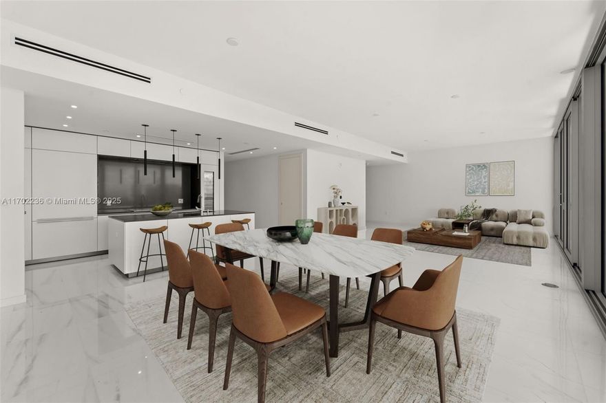 Experience unparalleled luxury at Aston Martin Residences, where every detail is crafted to elevate your lifestyle and create an oasis of elegance. This exquisite residence features Bulthaup cabinetry, quartz countertops, Gaggenau appliances, and white marble floors throughout. Retreat to Thassos marble bathrooms adorned with Hansgrohe fixtures and Duravit toilets for a spa-like experience. The building offers 42,000+ SF of “Sky Amenities” including an infinity pool, fitness center, spa, private dining, curated art gallery, movie theaters, virtual golf, and more. Residents enjoy 24-hour concierge, valet, electric car charging, bicycle storage, and high-speed elevators. With hospitality-inspired services and a state-of-the-art business this is a home that redefines the art of luxury living.