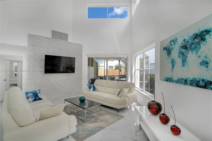 ***4 MONTH MINIMUM LEASE WITH OPTION FOR SOCIAL SPORTS MEMBERSHIP*** Step into your fully furnished
and renovated dream home in the prestigious Broken Sound community. This beautifully reimagined 4-bedroom,
3.5-bathroom residence, boasts a practical layout with a first-floor master suite and three guest bedrooms
upstairs. The newly redone kitchen features a spacious design perfect for entertaining. Wide windows and high
ceilings fill the home with natural light, complemented by LED lighting that accentuate the beautifully revamped
interior. Elevate your lifestyle with the award winning and recently renovated Broken Sound Clubhouse. Featuring
multiple pools, restaurants, bars, tennis and pickleball courts, and a top-notch fitness center