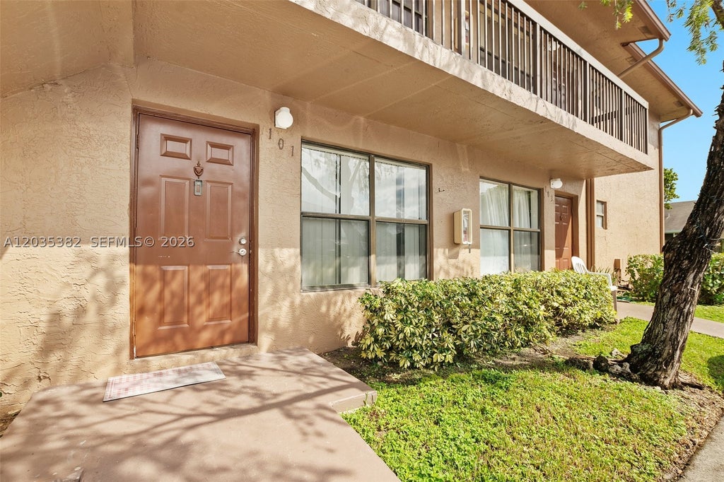 Photo of 10053 Winding Lake Rd #101, Sunrise, FL 33351 (MLS # A12035382)