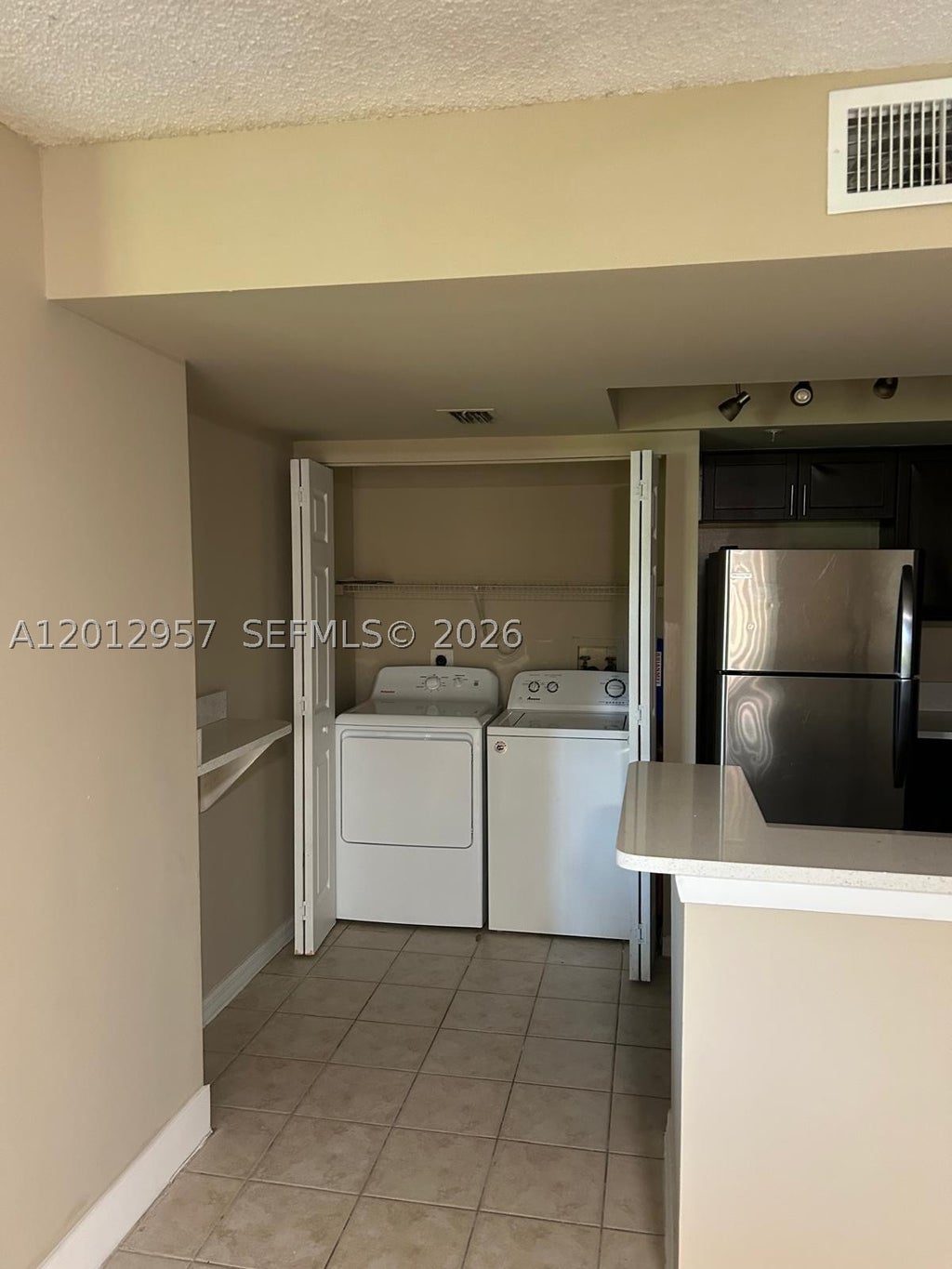 Photo of 4151 N Haverhill Rd #1514, West Palm Beach, FL 33417 (MLS # A12012957)