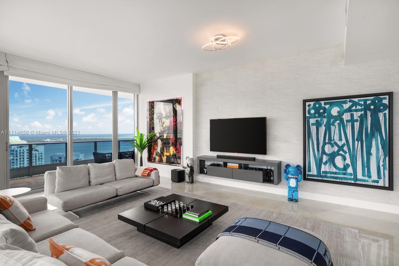 Step Inside With Me! Enter your lower penthouse with sweeping Eastern views of Biscayne Bay and Miami skyline. Spectacular corner residence features 3 Beds, 3.5 Baths, 10’ ceilings with open floor plan. Kitchen complete with Calacatta marble, Italian finishes, Sub Zero and Miele appliances. Wood and marble flooring shines under the custom modern light fixtures found throughout. Primary suite hosts dual walk-in closets, oversized soaking jacuzzi tub & gorgeous water views. Live the Epic lifestyle in the heart of Miami steps away from all of the hot spots with resort style amenities including: 2 restaurants, fitness center, lounge, sauna + pool, and Zuma in your lobby.