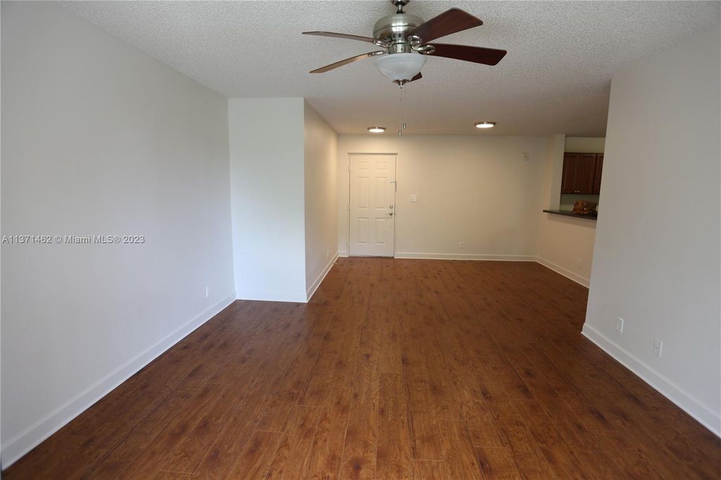 Photo of 10115 W Sunrise Blvd #203, Plantation, FL 33322 (MLS # A11371462)