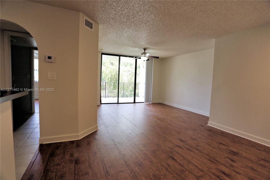 Photo of 10115 W Sunrise Blvd #203, Plantation, FL 33322 (MLS # A11371462)