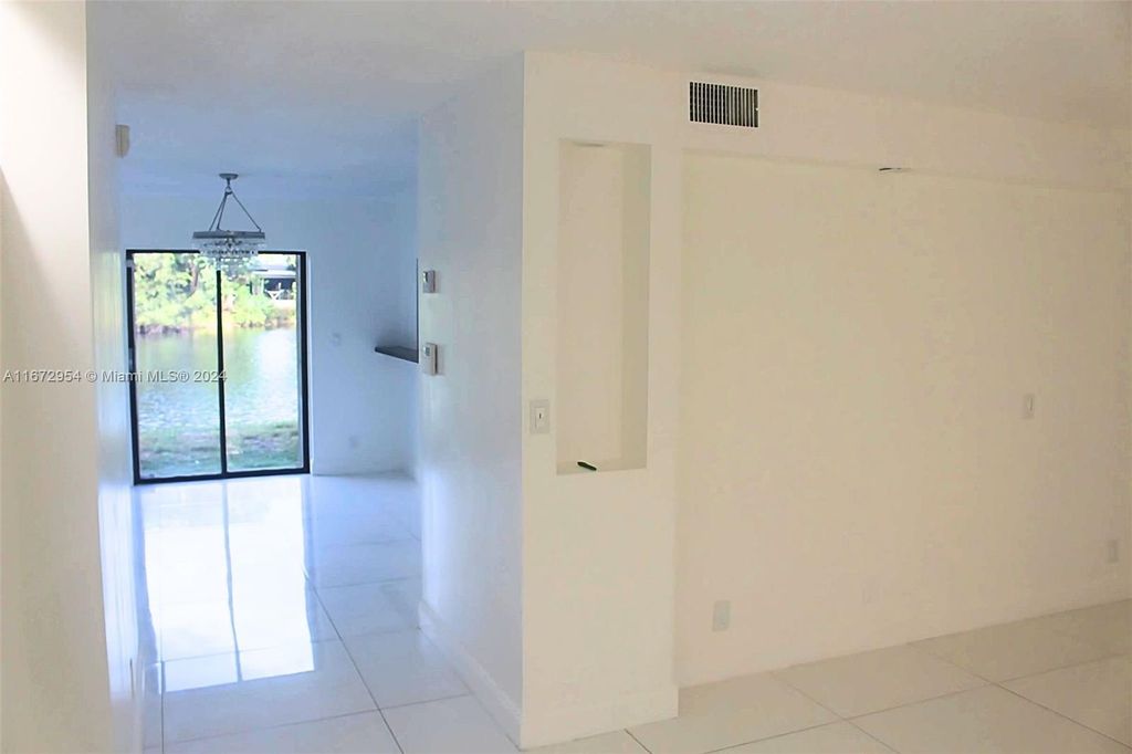 Photo of 232 Wimbledon Lake Dr #232, Plantation, FL 33324 (MLS # A11672954)