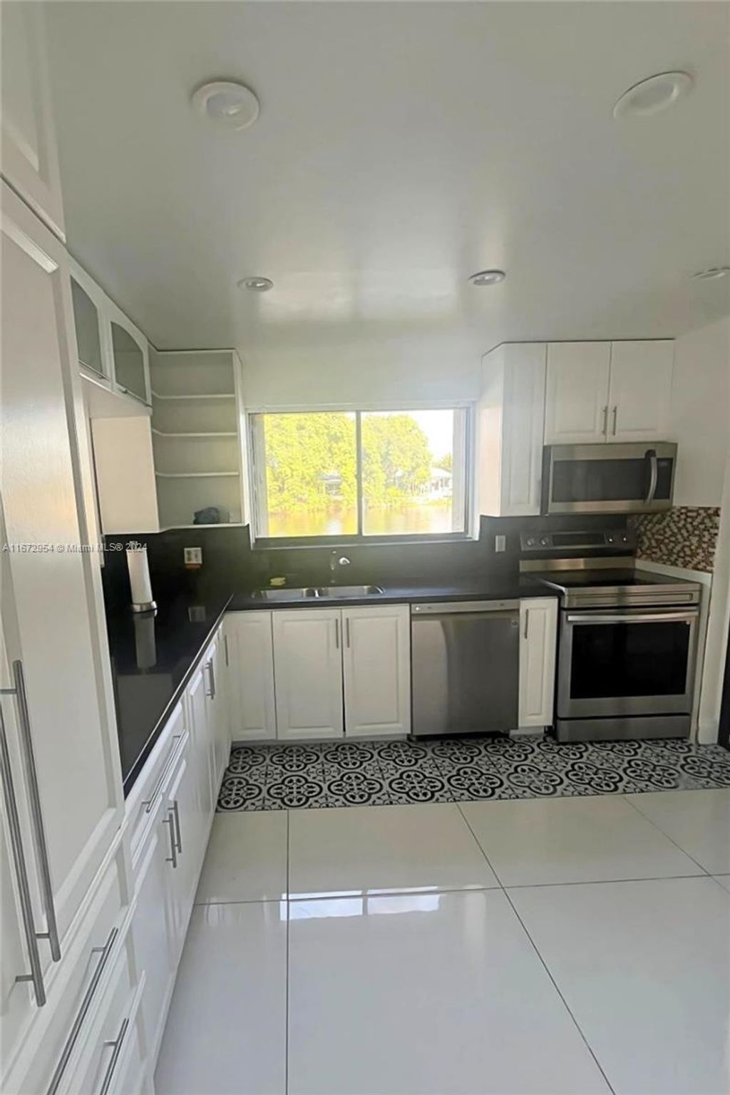 Photo of 232 Wimbledon Lake Dr #232, Plantation, FL 33324 (MLS # A11672954)