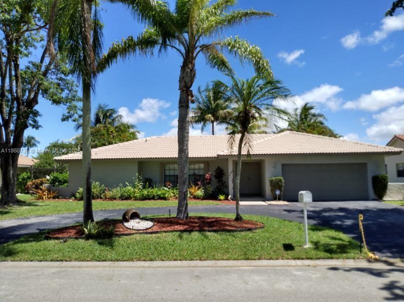 The house is after renovation: popcorn ceiling off, completely new bathrooms, painting, lights, fans, brand new A/C system, excellent condition washer and dryer machines, and water heater. Great 4/2.5 bedrooms one-story single house in an excellent family neighborhood - Cypress Run in Coral Springs. It has big rooms, a split layout, a big-screened patio, and a pool by the canal. Great kitchen with real wood cabinets, granite counters & backsplash, stainless steel appliances, snack bar opens to the family room, breakfast nook has the pool & water views, vaulted ceilings, and accordion Hurricane Shutters. All rooms around the house have laminate floors. "A" rated schools, near Sawgrass Expwy, parks, restaurants, and shopping plazas. No HOA approval is needed; it's not a gated community.