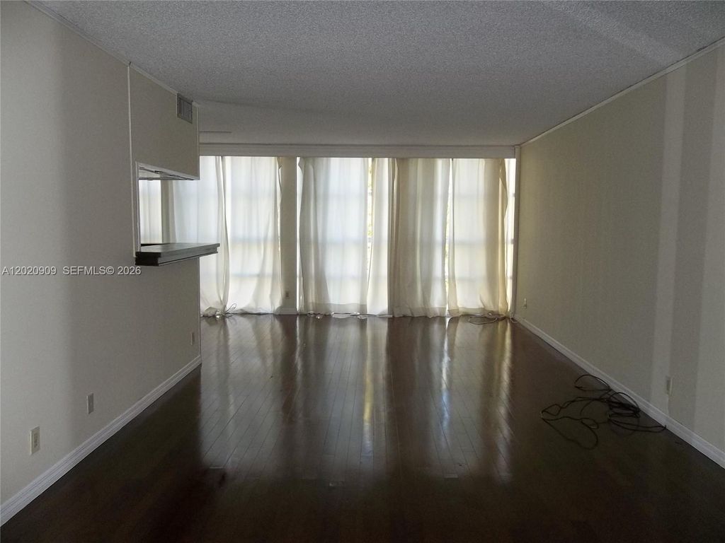 Photo of 801 Three Islands Blvd #308, Hallandale Beach, FL 33009 (MLS # A12020909)
