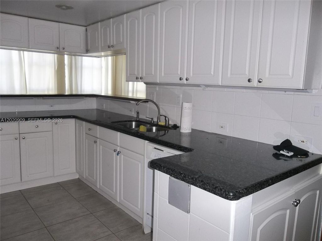 Photo of 801 Three Islands Blvd #308, Hallandale Beach, FL 33009 (MLS # A12020909)