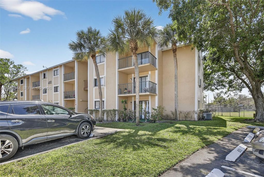 Photo of 400 W Palm Cir W #306, Pembroke Pines, FL 33025 (MLS # A11989944)