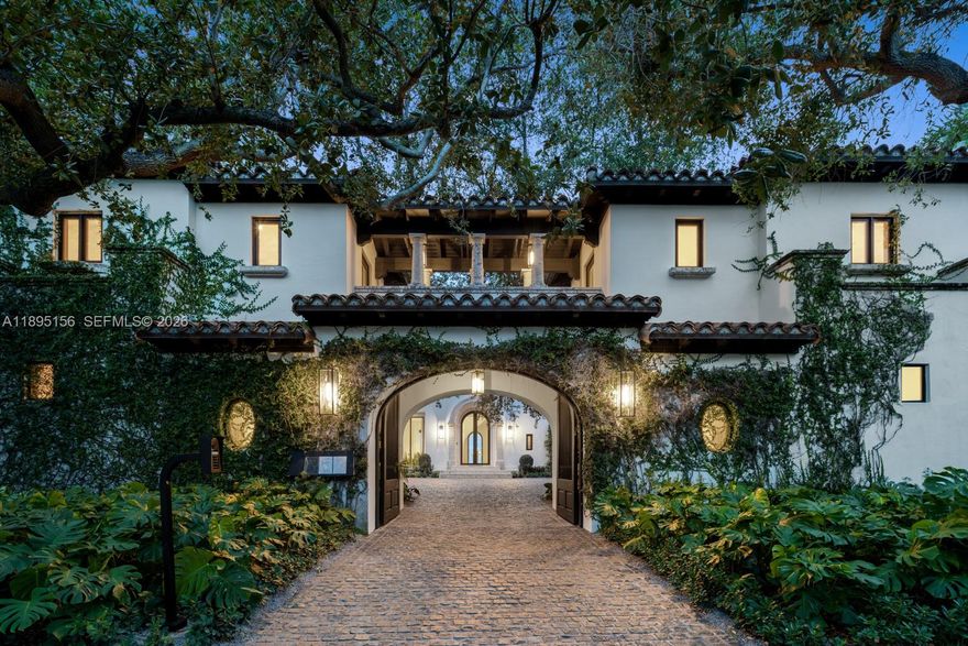 Timeless Architecture Reimagined with Modern Elegance on Iconic N Bay Rd. Developed by Menin Homes & architecture by Zeb Jarosz, this waterfront estate showcases wide open bay & skyline views. Main house offers 4BD/4.5BA while a detached guest residence includes 3BD/3BA with garage. 12’ ceilings, Marmorino plaster walls & wood flooring throughout frames light-filled interiors anchored by a bamboo-flamed travertine fireplace. Bespoke ITALKRAFT kitchen with Sub-Zero & Wolf appliances complements marble-accented baths & custom millwork. Primary suite boasts a steam room, sauna, his & her toilets & terrace with a cold plunge. Enjoy a new pool, jacuzzi, Cocoon shower & custom BBQ. Fully automated Control4 smart home w/ generator, Apparatus lighting & ATRA furnishings complete this masterpiece.