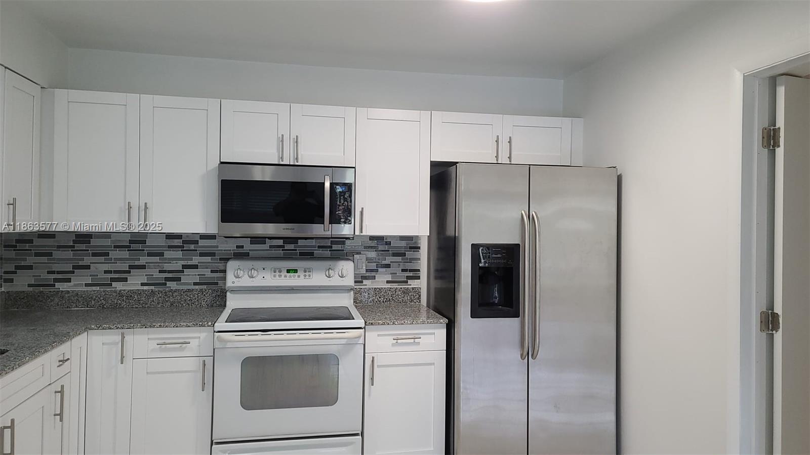 3/2 in SW Halladale upgraded in highly desirable residential area. Tiled throughout with lots of closet space. Large NEW open Kitchen, New appliance . Central AC, Laundry. 2 parking space. Easy to show. Fast approval