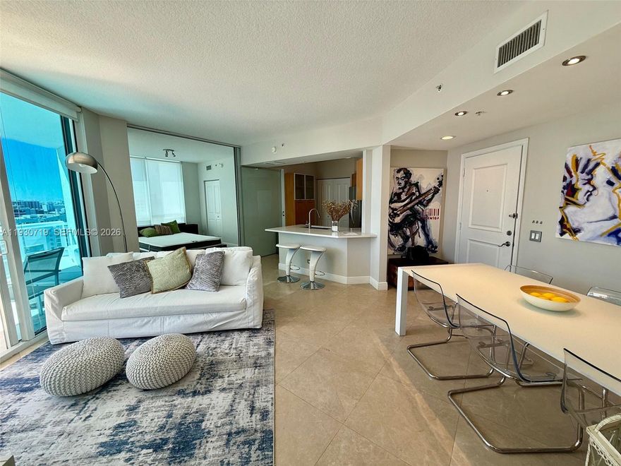 Featuring a bright, spacious layout framed by floor-to-ceiling impact windows, this modern and furnished 2 BR / 2 full bathrooms, is located in the heart of Edgewater. A large balcony connects both bedrooms and the living area with Intracoastal views. Stainless steel appliances, brand-new in-unit washer & dryer and glass shower doors. Walking closets. Internet included. Assigned covered parking space. Amenities include fitness center, remodeled lap pool, Jacuzzi, sauna, BQQ area, conference and social room. Building has full time security and concierge. Walking distance to Midtown, Design District and Wynwood. Just minutes from Miami Beach, Downtown, Brickell and airport. Rental insurance required.