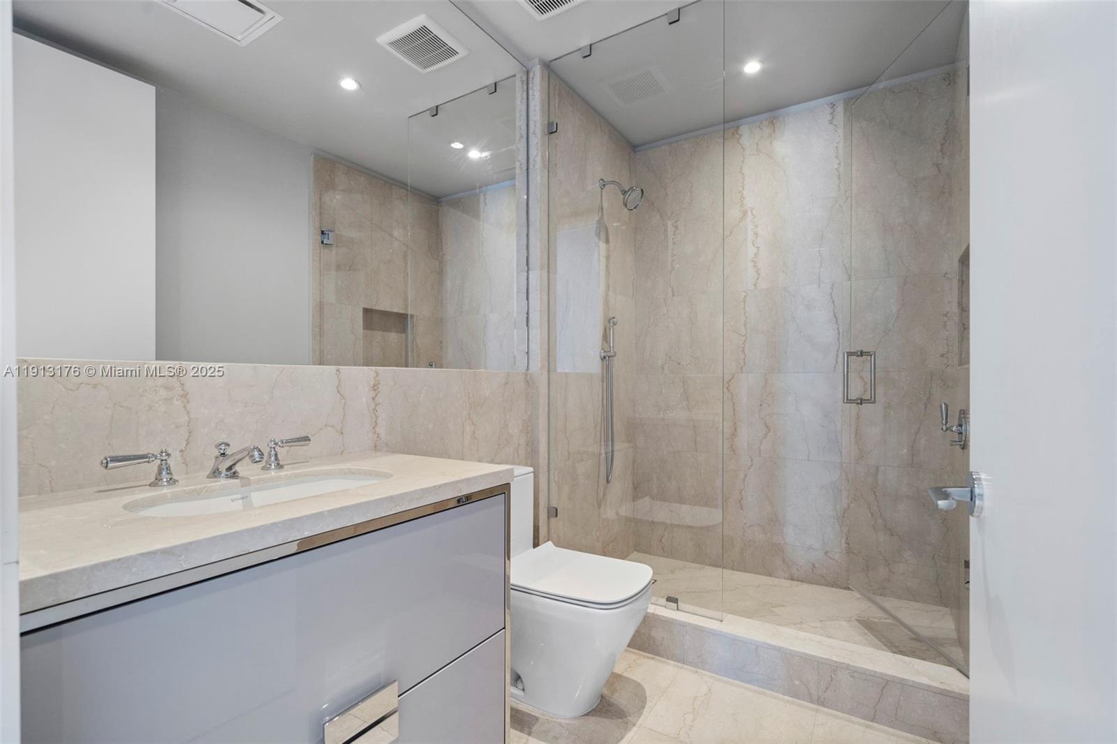 15701 COLLINS CONDO - Residential Lease