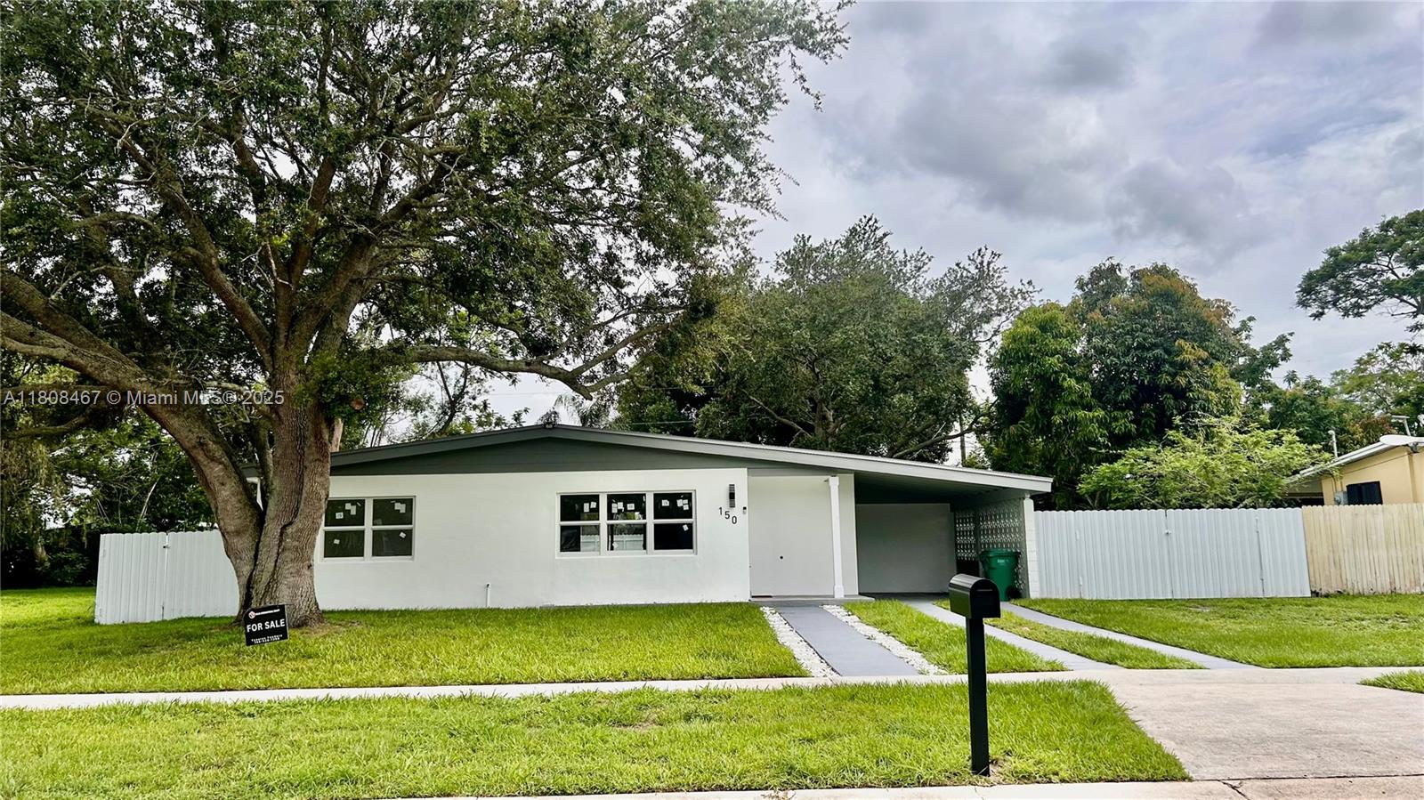 Beautifully renovated 2-bedroom, 1-bathroom home that combines modern upgrades with everyday comfort. Thoughtfully updated throughout, this residence is perfect for buyers seeking a turnkey property in a great location. Features include:Fully renovated interior with fresh finishes. Brand new A/C system. New wood laminate flooring throughout. Brand new hurricane impact windows and doors for enhanced safety and energy efficiency. Newly installed privacy fence surrounding the yard. Covered carport for convenient, weather-protected parking. Washer and dryer hookup for added convenience. All-new Fridgaire kitchen appliances. Whether you're a first-time buyer, downsizing, or looking for a low-maintenance investment, this home offers outstanding value in Port St. Lucie.