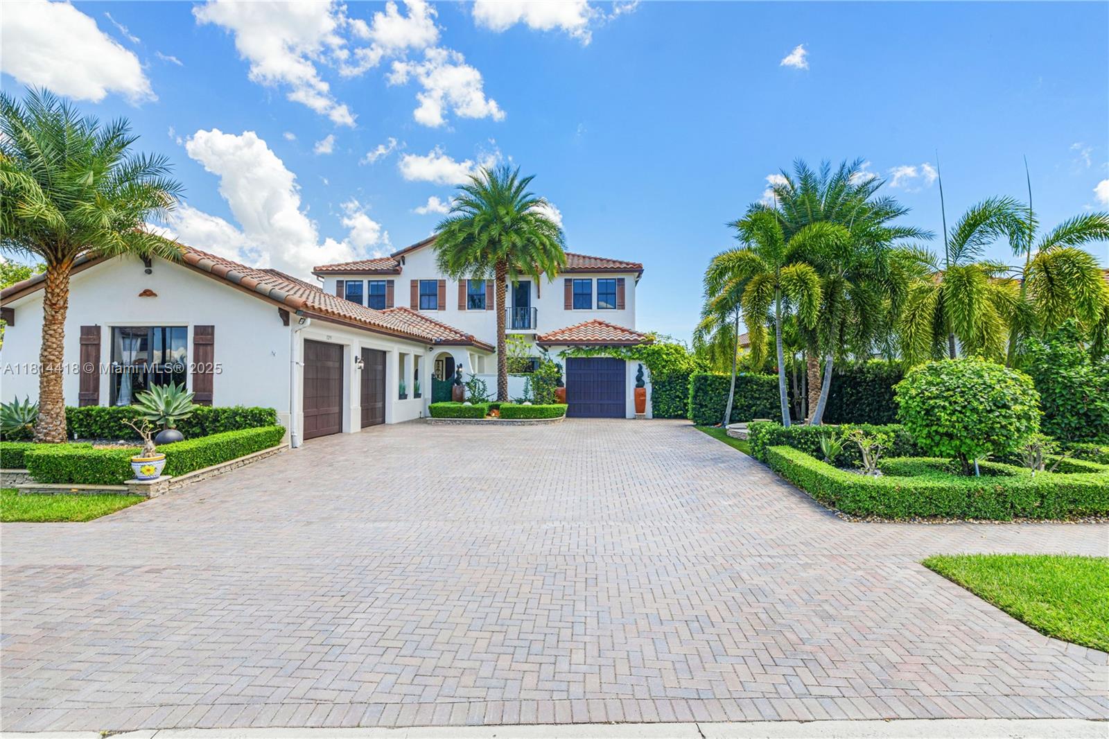 Welcome to paradise! This luxury waterfront estate home offers 5 bedrooms, 6 baths. The individual spaces include your private spa w/ a state of the art sauna, game room, formal dining, formal living room, a sizable family room, breakfast & a gourmet kitchen. The outdoor space encompasses a secluded resort-like ambiance. Including a full service summer kitchen, pergola, sitting room, lap pool w/ spa & waterfront putting green. This home is equipped w/ hurricane impact glass, portable generator, 3 car garage and is located on a cul de sac. the community of Monterra offers resort style amenities including tennis & b-ball courts, fitness center, tot lot & dog park. Zoned for a+ rated schools, just minutes from the airport & major highways. Bedroom floors is the same light color downstairs.