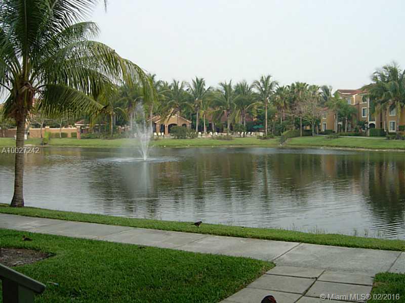 This is an updated spotless 1 bedroom 1 bath condo with a garage that has additional attic space located inside The Enclave's gated community in Miramar. This unit features marble and dark wood floors, washer and dryer inside of the unit, plantation shutters and brand new inside and out high efficiency AC unit. TV in bathroom and TV mounts in living room and bedroom are included. Amenities include clubhouse with pool, tennis courts, gym, raquetball, security, playground, BBQ area, volleyball sand court!!