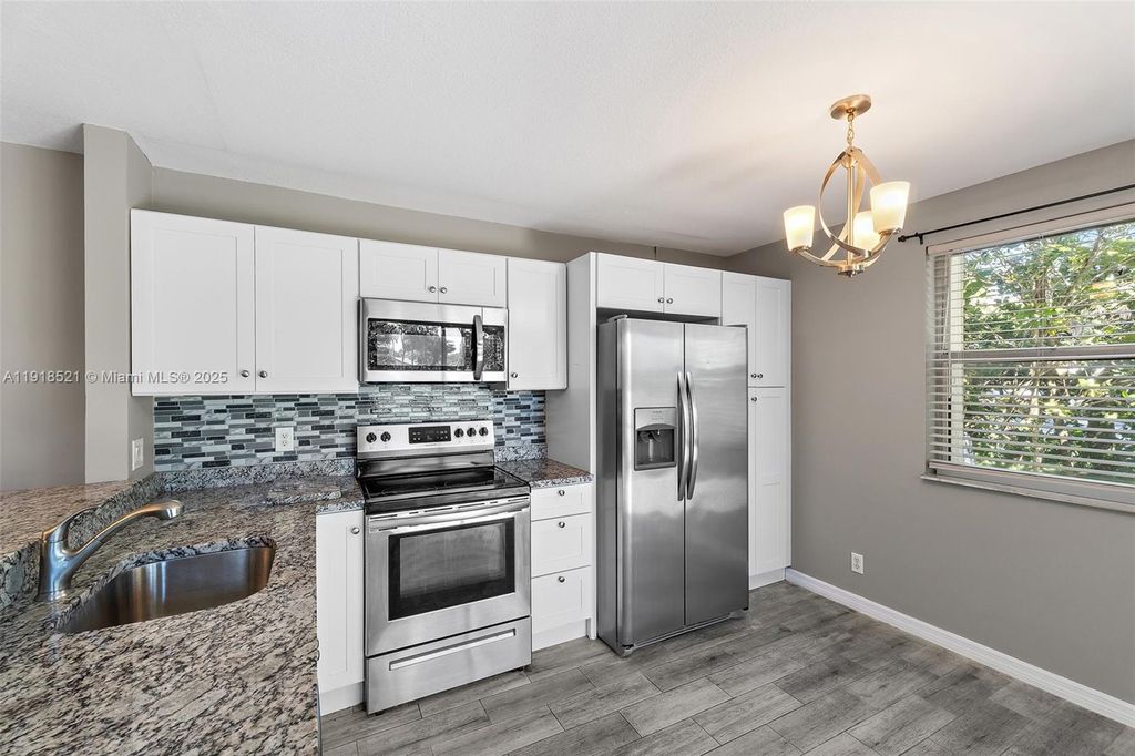 Photo of 3990 SW Greenwood Way #A, Palm City, FL 34990 (MLS # A11918521)