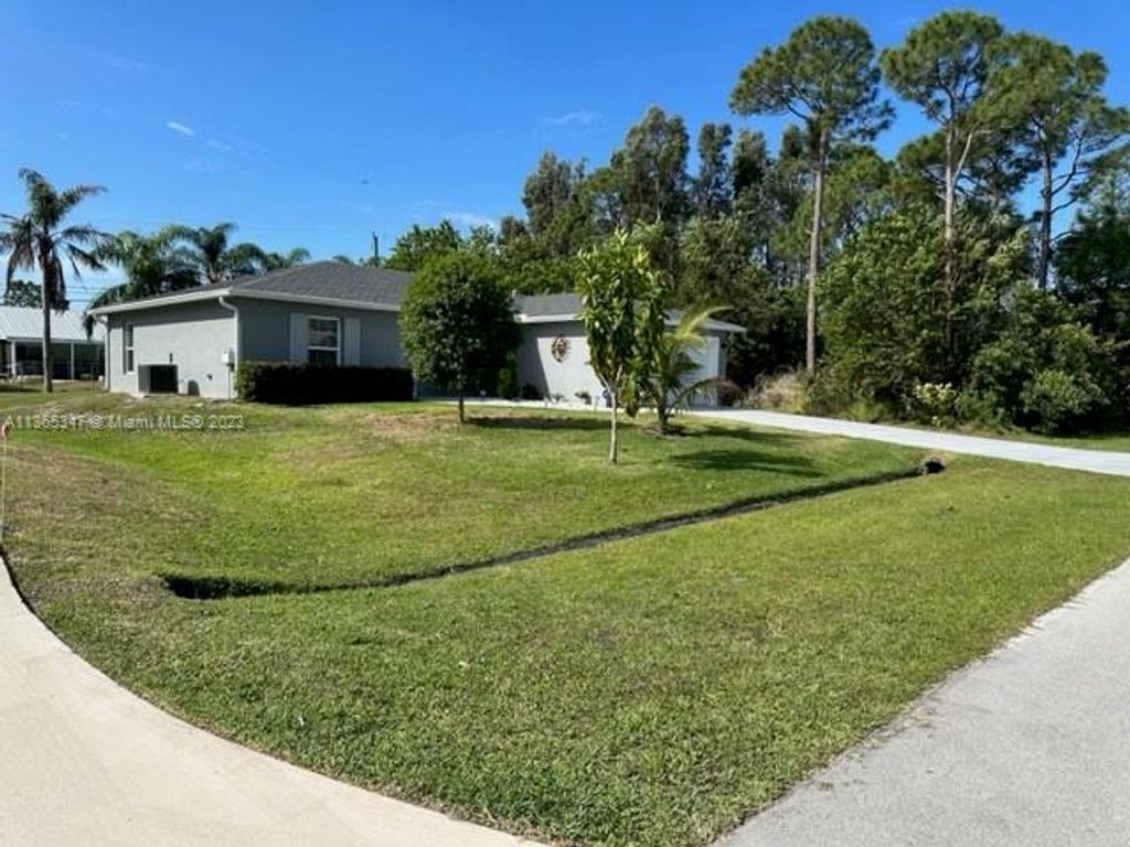 Photo of 1250 SW Albenga Ave, Port Saint Lucie, FL 34953 (MLS # A11365347)