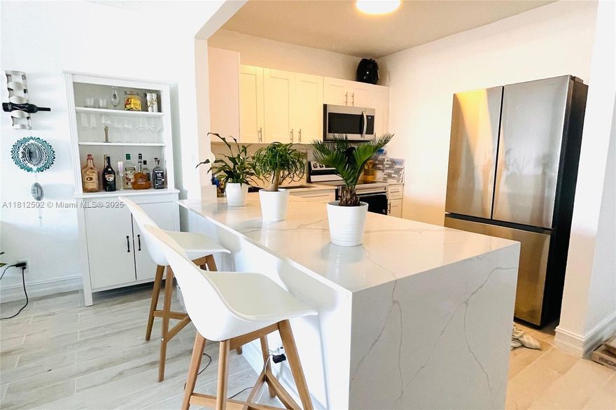Bright and Well Kept 1/1 condo in North Bay Village. Some recent updates w/ Open floor plan connects the living, dining, and kitchen areas and New Tile flooring throughout the main living spaces and bedroom. Kitchen features white new cabinets, s/steel appliances, & stone countertops. The spacious bedroom with a walk-in closet. The bathroom is well maintained and features a granite countertop, though the flooring has not been recently updated. Balcony with bay views.  On-site laundry facilities on every floor, 1 assigned parking space, secured lobby access, Security cameras, elevators, gym, a pool and BBQ areas. Pet-friendly building.  Ideally located just minutes from Miami Beach, Downtown Miami, and Major Highways. Sold "As Is". Cash Only. Great for Investors.  Showing by Appt Only.