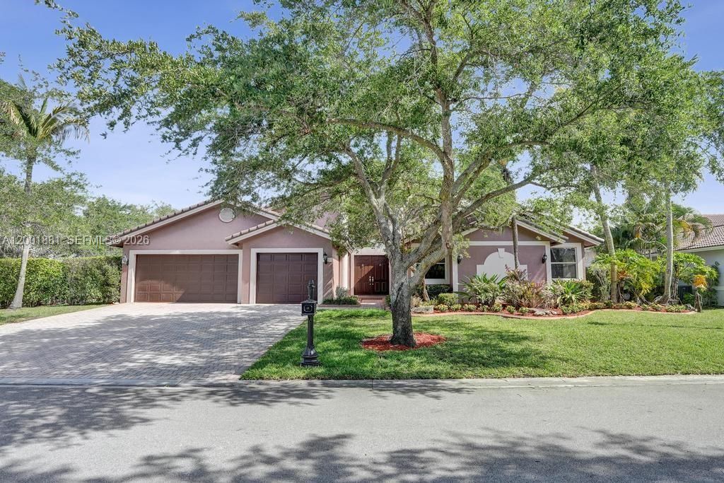 Photo of 9921 NW 60th Pl, Parkland, FL 33076 (MLS # A12001881)