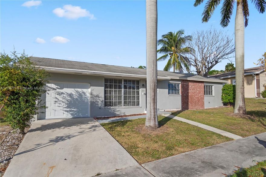 Welcome to your dream home in Lake Worth! This stunning single-family home boasts 3 spacious bedrooms, 2 bathrooms, and a convenient 1 car garage. The highlight of this property is the beautiful in-ground pool, perfect for relaxing and entertaining on hot summer days. Imagine hosting BBQs with friends and family, or simply unwinding after a long day in your own private oasis. The open floor plan and modern finishes throughout the home create a welcoming and comfortable atmosphere. Don't miss out on this incredible opportunity to own a piece of paradise in South Florida!
