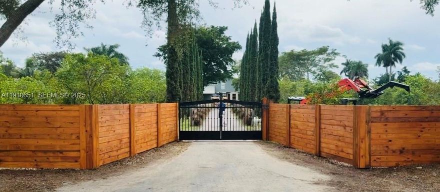 Lovely Redland Estate House 5 Acre
Relaxing unique chimney, french doors, family room overlooking fish pond & waterfall, & 1,500 sq. ft. custom built gazebo with pavers, kitchen, BBQ, lighting, & 2 outdoor bthrms.
Garage convert., metal roof. Whole house electrical panel flip from FPL to generator. Peaceful living, opportunity to create a profitable Airbnb & host rustic yet elegant event for over 50 cars. Additional multi-use buildings include: 5 workshops - electric, & water, of which the largest is 5,760 sqft, RV area, horse stable.
Industrial Irrigation Perkin Pump (1,400 GPM)., lush gardens,. Fruit trees. Custom built playhouse
Agri. Classified = lower taxes.. More than a home it's a serene lifestyle and business opportunity where creativity, & profitability can come together.