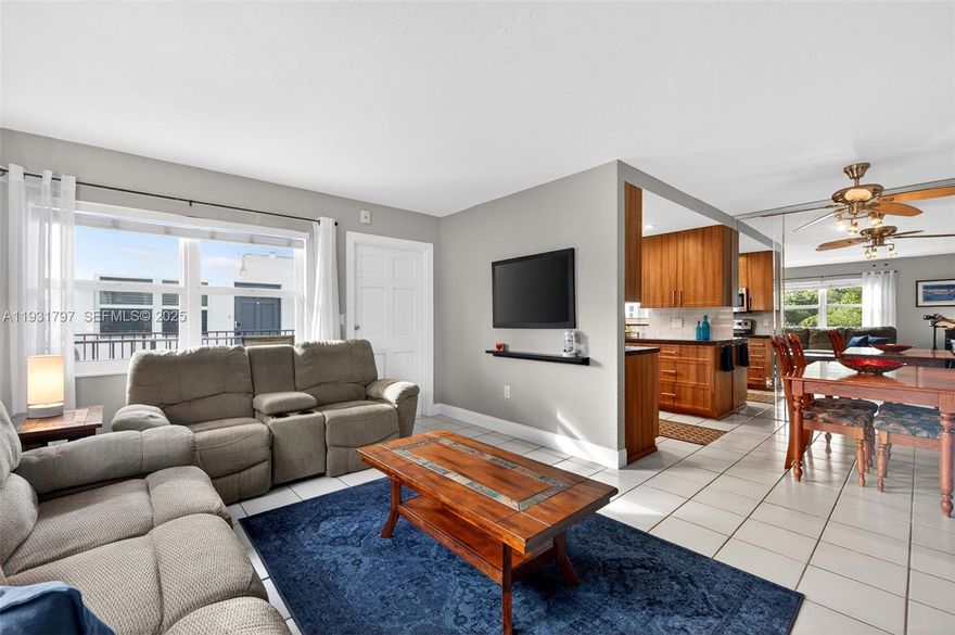 FURNISHED TURNKEY CORNER condo located on the 2nd floor in a great location in Hallandale Beach. The kitchen was updated a few years ago with new cabinets, ss appliances, countertops and backsplash. This 2 bed/2 bath has 2024 hurricane impact windows throughout, ceramic tile flooring, 
an enclosed back patio area, and an additional balcony on the front. Updated light fixtures.  The primary bedroom has it's own private bathroom and plenty of closet space. Well maintained AC and water heater. A spacious storage area inside the unit. Parking spot is located right next the condo. Small building, only 2 stories and laundry room is on the second floor. Building has a pool in the middle, courtyard area, a sitting area, BBQs, shuffleboard, etc. Building renovations include a new roof in 2025, painting, and concrete repairs in 2025; HOA is well managed and with strong finances.  Great location close to the beach, Gulfstream, Aventura mall, Ft Laud. Int. Airport, restaurants, shopping and more.  You can rent right after purchasing (no waiting period) making this unit perfect for an investor, someone looking to use it as a second home or be a full time resident.