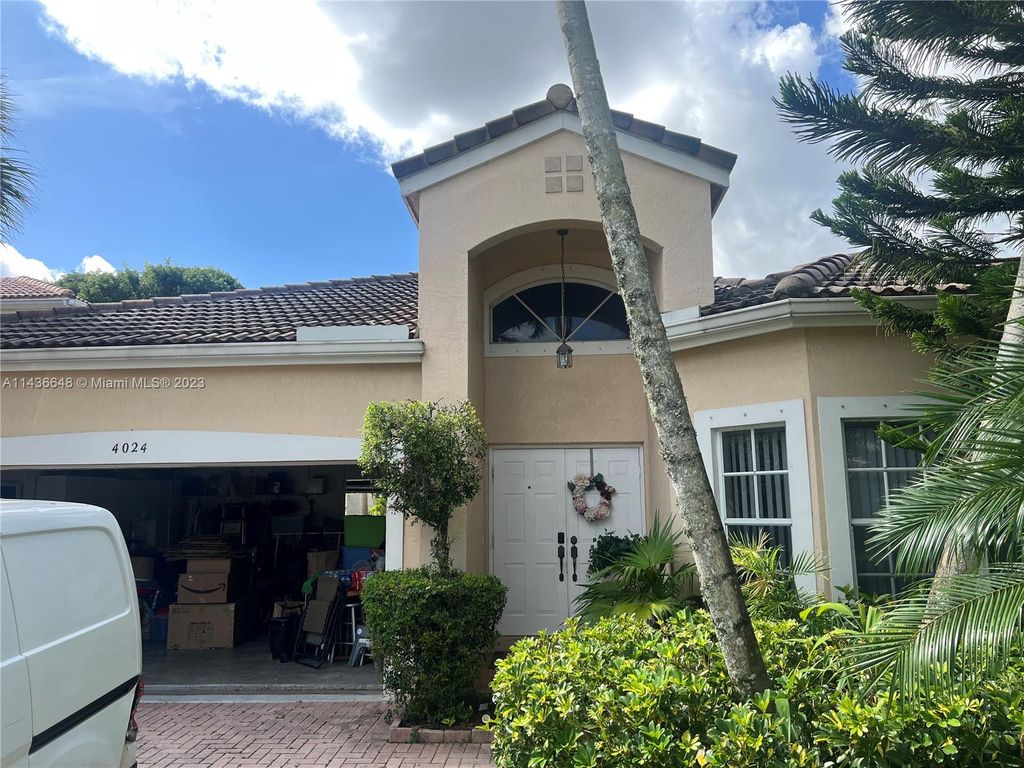 Photo of 4024 NW 62nd Dr, Coconut Creek, FL 33073 (MLS # A11436648)