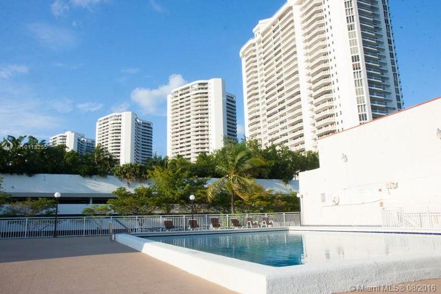 The property you've been looking for! Beautiful & spacious 2-story, 2, 2.5 + den waterfront condo in the top Miami location of Guard-Gated Eastern Shores steps to Sunny Isles Beach, Aventura & Intracoastal Malls, Restaurants, iPic Movies & Oleta Park w/ kayaking/biking/picnic/bbq & more. Features huge windows w/ relaxing views over the waterway & split-floor plan w/ 2 large masters, walk-in closets, updated floors, W/D & extra den. 40yr paid in full w/ new roof, painted exterior & waterfront pool. Pets Y.