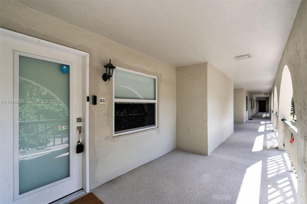 Photo of 4801 Martinique Pl #D2, Coconut Creek, FL 33066 (MLS # A11944890)