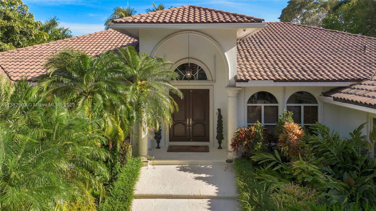 Gorgeous one-story estate located in the prestigious South Gables area. This elegant house has 5 beds and 6 baths, the open floor plan features an spectacular entrance foyer, formal living and dining overlooking the pool. Huge gourmet kitchen w/breakfast area and family room. Exquisite master bed with a sitting area and access to the backyard. Large walking closets, his and hers vanities, shower & tub. Secondary bedrooms are very generously sized with in suite bathrooms. Studio, cabana bathroom, laundy room, covered garage and carport. Surrounded by lush landscaping providing privacy, extra large covered terrace perfect for entertainment. Guest house, full home generator and heated pool/jacuzzi.