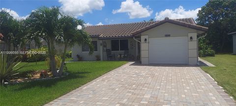 Photo of 7008 NW 95th Ter, Tamarac, FL 33321 (MLS # A11996055)