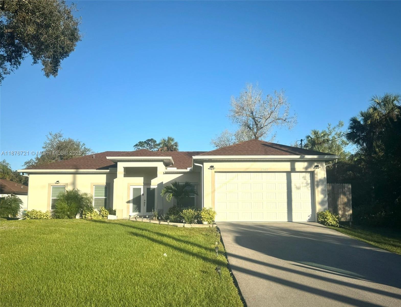 This stunning NEWLY BUILT HOME, completed in 2023, offers a perfect blend of MODERN LIVING and VERSATILITY on a 1.17-ACRE LOT. Thoughtfully designed, the interior features a SPACIOUS OPEN FLOOR PLAN that seamlessly integrates LIVING, DINING, and ENTERTAINMENT SPACES. Large windows flood the home with NATURAL LIGHT, highlighting the ELEGANT FINISHES, including PREMIUM FLOORING, CUSTOM CABINETRY, and DESIGNERFIXTURES. The well-equipped kitchen offers ample storage and counter space, making it ideal for both casual meals and entertaining. Adding to the home's functionality, the CONVERTED GARAGE has been transformed into a fully independent STUDIO APARTMENT, complete with its own entry, making it perfect for GUESTS, RENTALINCOME, or a PRIVATE WORKSPACE