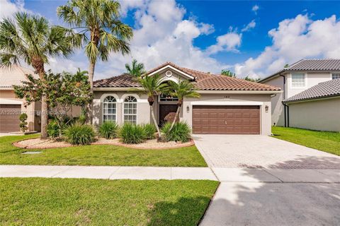 Photo of 180 SW 167th Ave, Pembroke Pines, FL 33027 (MLS # A12026707)