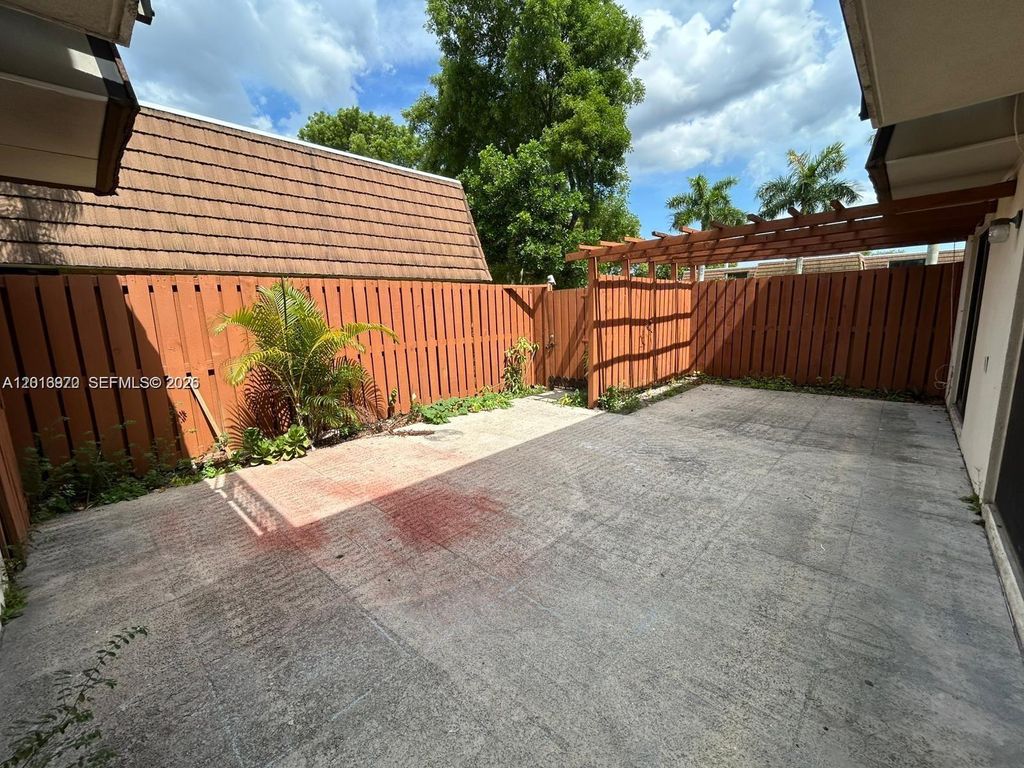 Photo of 9106 SW 20th St #C, Davie, FL 33324 (MLS # A12016970)