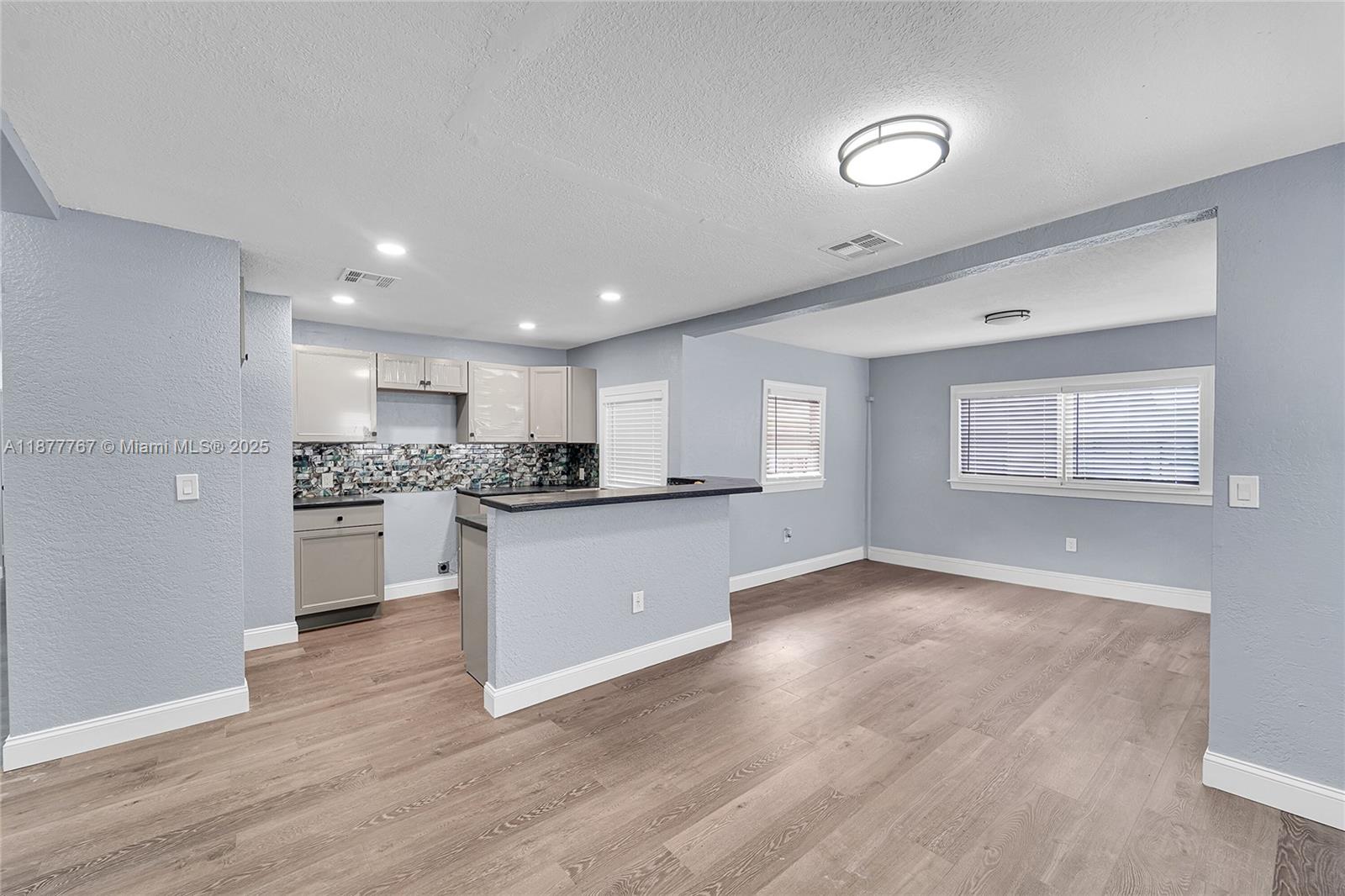 Welcome to this Fully Remodeled GEM. 4/2 New Roof, floors, appliances, blinds, and more. Near major highways. Section Welcome. Rapid Approval. The house will be painted on the outside, and landscaping will be done. New stainless steel appliances and sink to be installed before move-in.