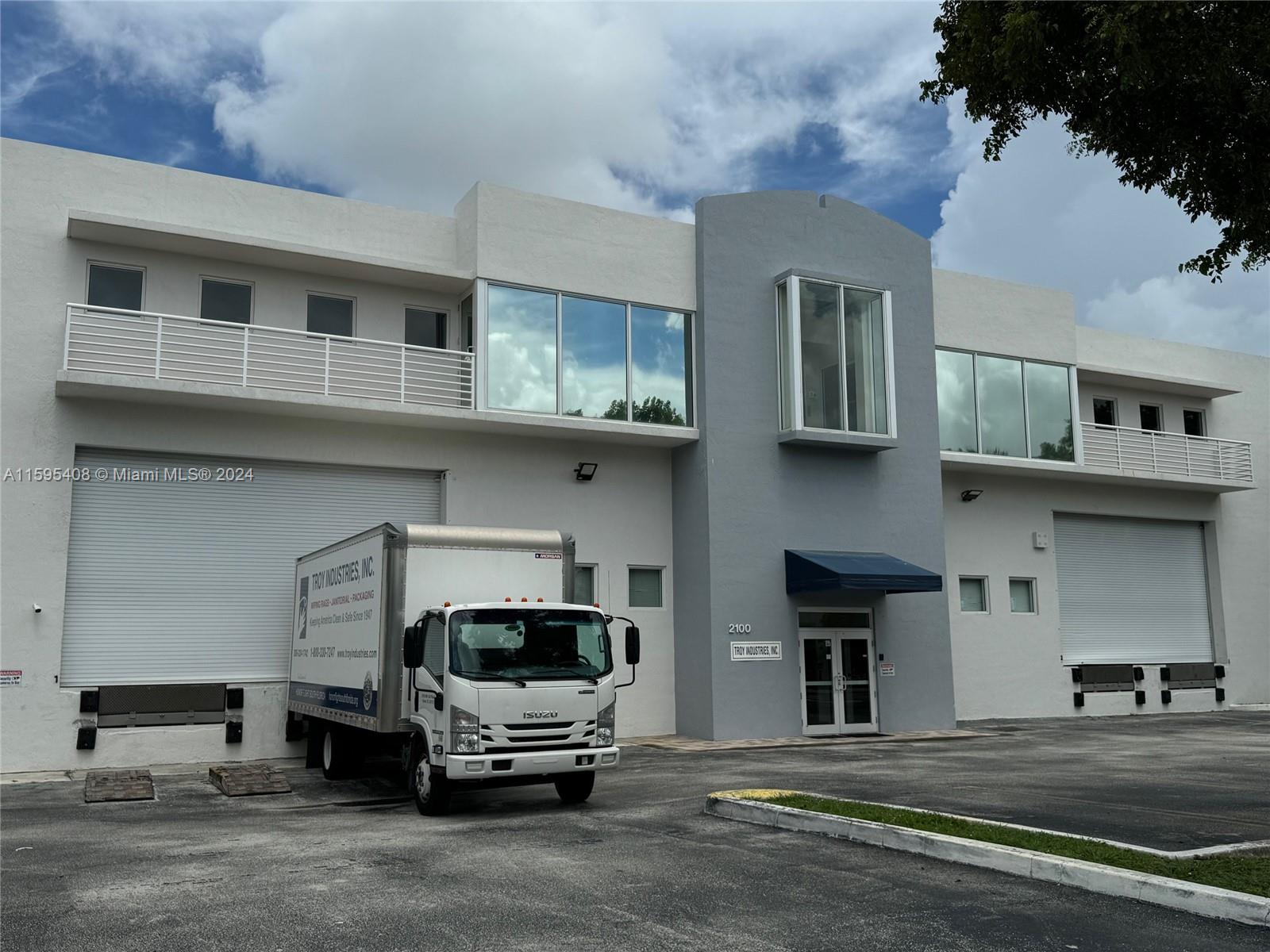This warehouse for lease in Doral has a new roof, and new, impact windows. It is a stand alone corner lot property.
Total rentable square ft is 23,296. Warehouse area is 17,656 sq ft, 24 ft high clear ceiling height. There are two double wide dock high doors (fits 4 trucks at a time). The docks have hydraulic dock levelers.
Property has 21 parking spaces. Most are towards the front of the building and some on the side as well.
There is an elevator in the office area. Main floor office space is 1,710 sq ft. The second floor has a combination of office space and storage area that is 3,930 sq ft.