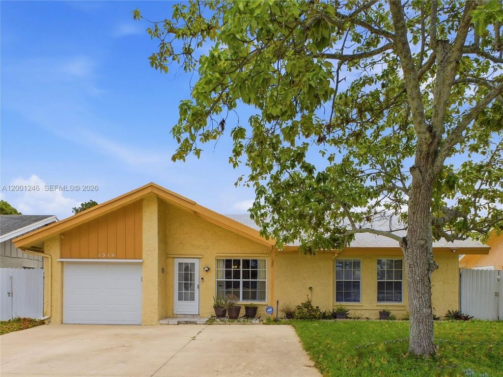 Photo of 1319 SW 74th Ave, North Lauderdale, FL 33068 (MLS # A12001246)