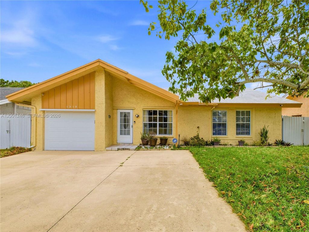 Photo of 1319 SW 74th Ave, North Lauderdale, FL 33068 (MLS # A12001246)
