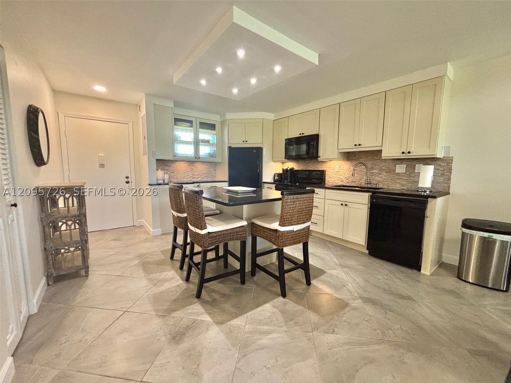 Photo of 3920 Inverrary Blvd #607C, Lauderhill, FL 33319 (MLS # A12095726)