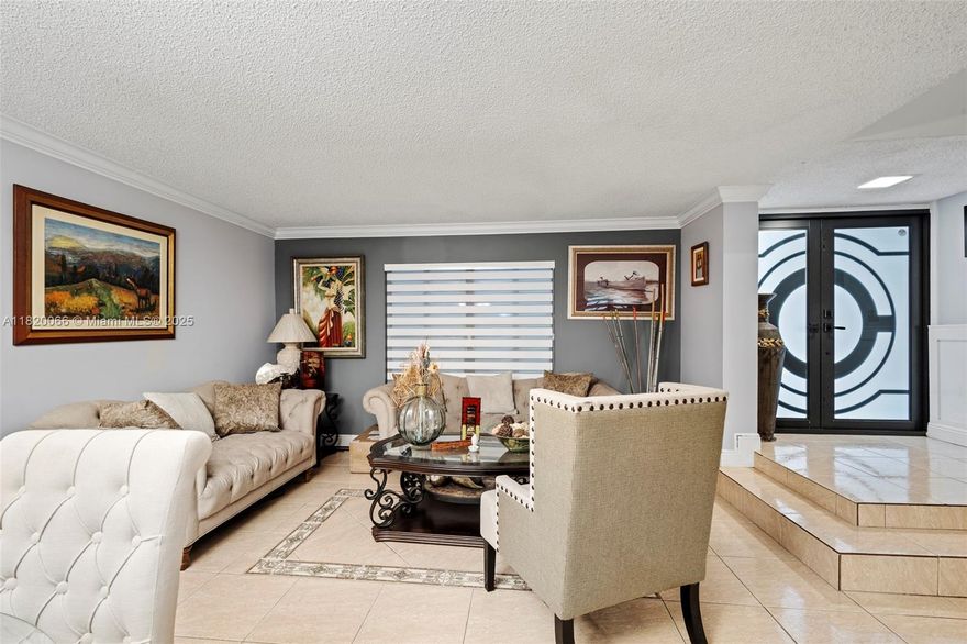 This beautiful townhouse is located in the desirable community of Villas West in Pembroke Pines. Being one of the largest models in the community you'll enjoy gorgeous double entry glass doors with a grand entry area and a spacious open floor plan. 3 Bedrooms, 2 and 1/2 bathrooms with formal living-room, dining room area, family-room, covered patio, and a beautiful front garden with a sitting area. Nice upgrades, new roof, new AC unit, new tankless water heater and stainless steel appliances. The association is very flexible with very few restrictions and  include nice amenities such as pool, playground, basketball and tennis courts. Walking distance from the mall, grocery stores, the Pembroke Pines new City Center, hospitals, and great schools. Very safe area with friendly neighbors.
